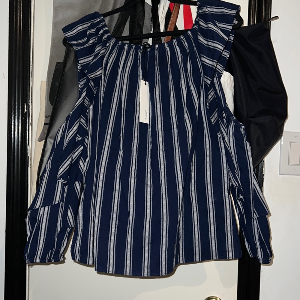 Blue with semi white lines ruffle top